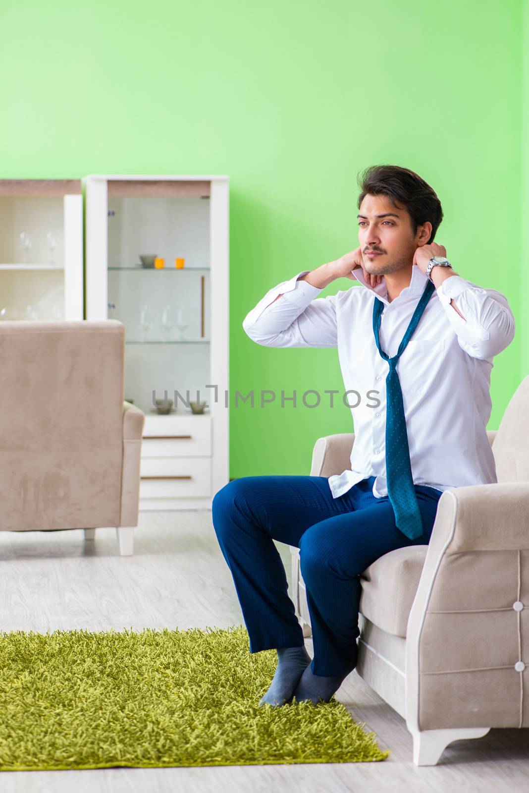Man dressing up and late for work