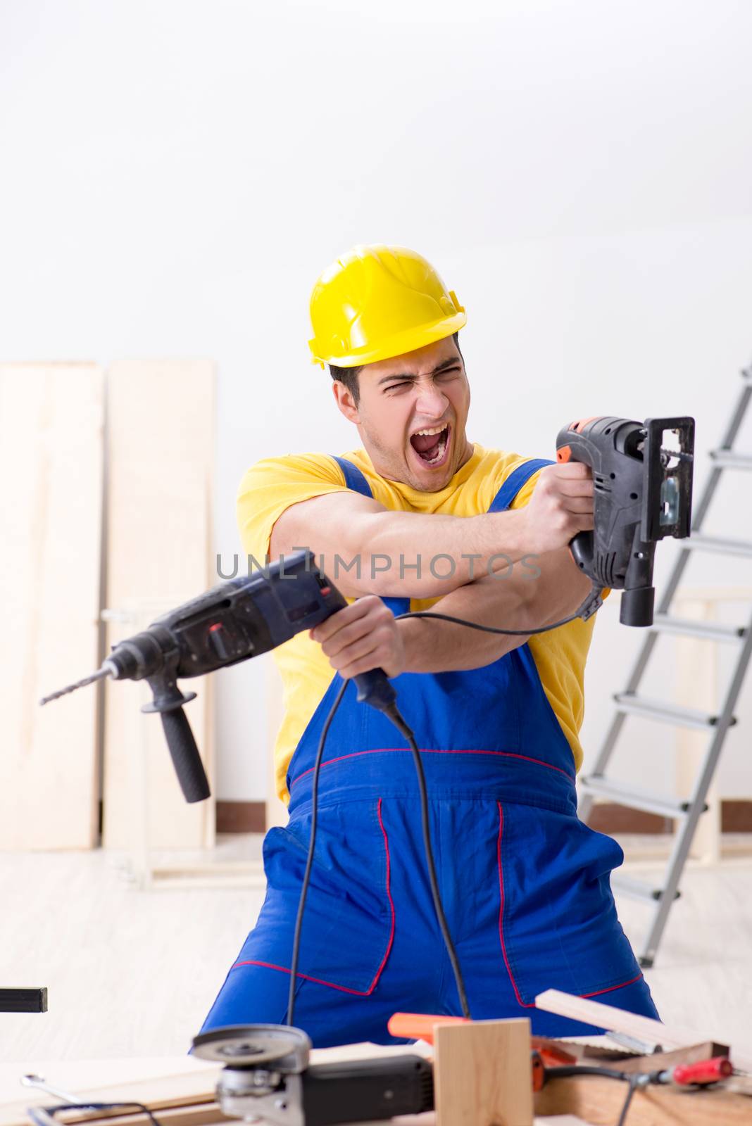 Floor repairman disappointed with his work 