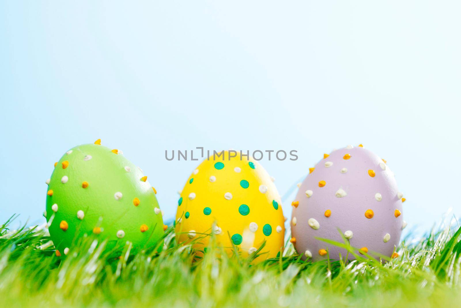 Easter eggs in grass by Yellowj