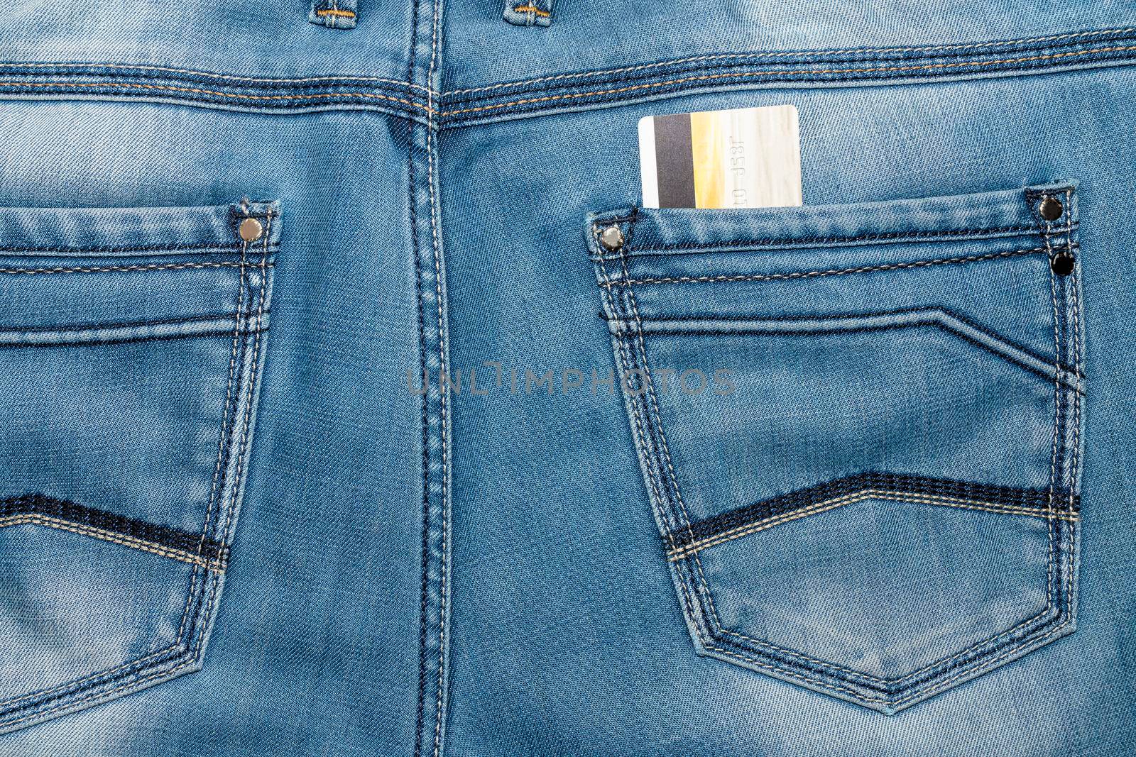 bank card in the back pocket of your pants. High quality photo