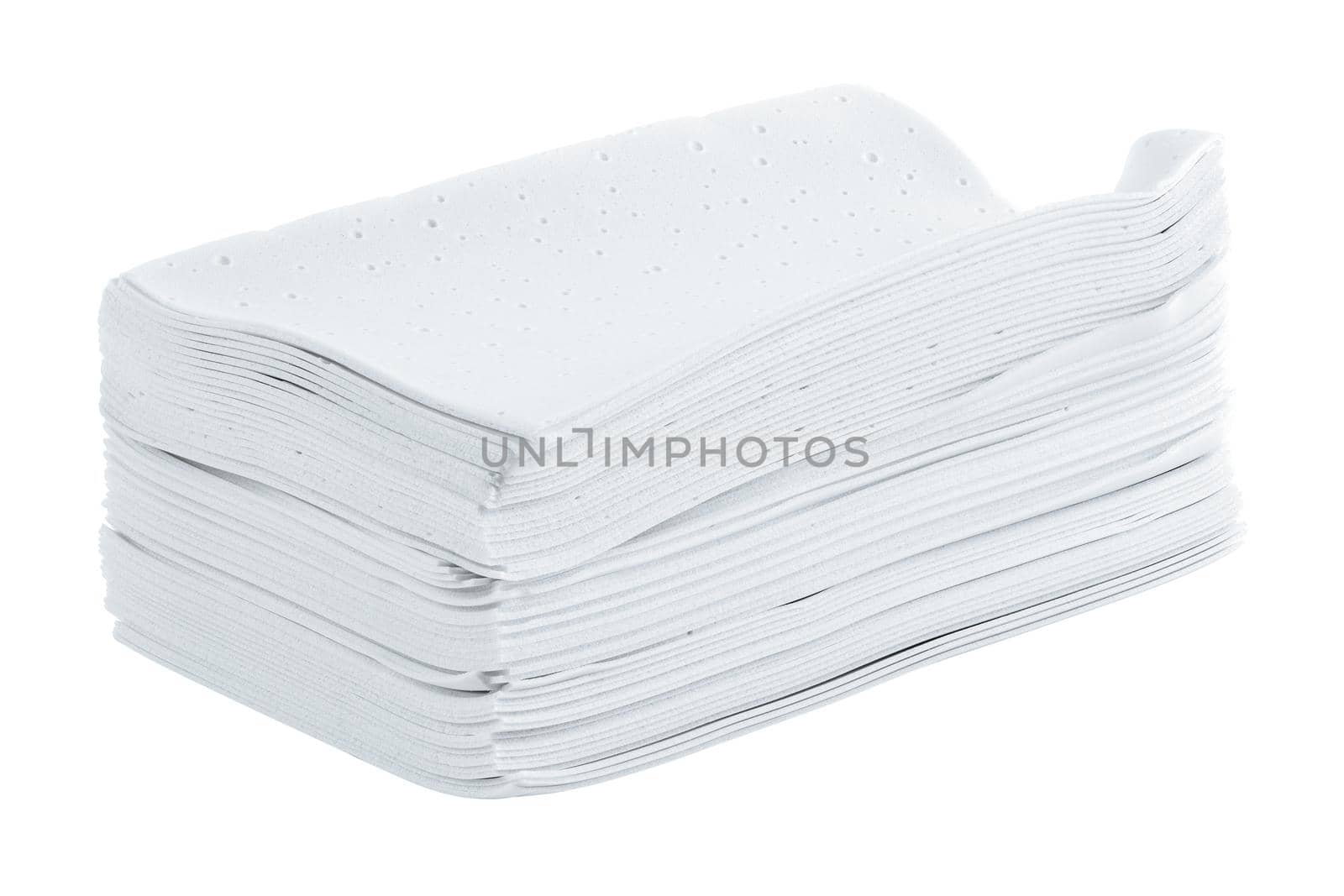 stack of white liquidless and powderless laundry detergent squares sheets isolated on white background.