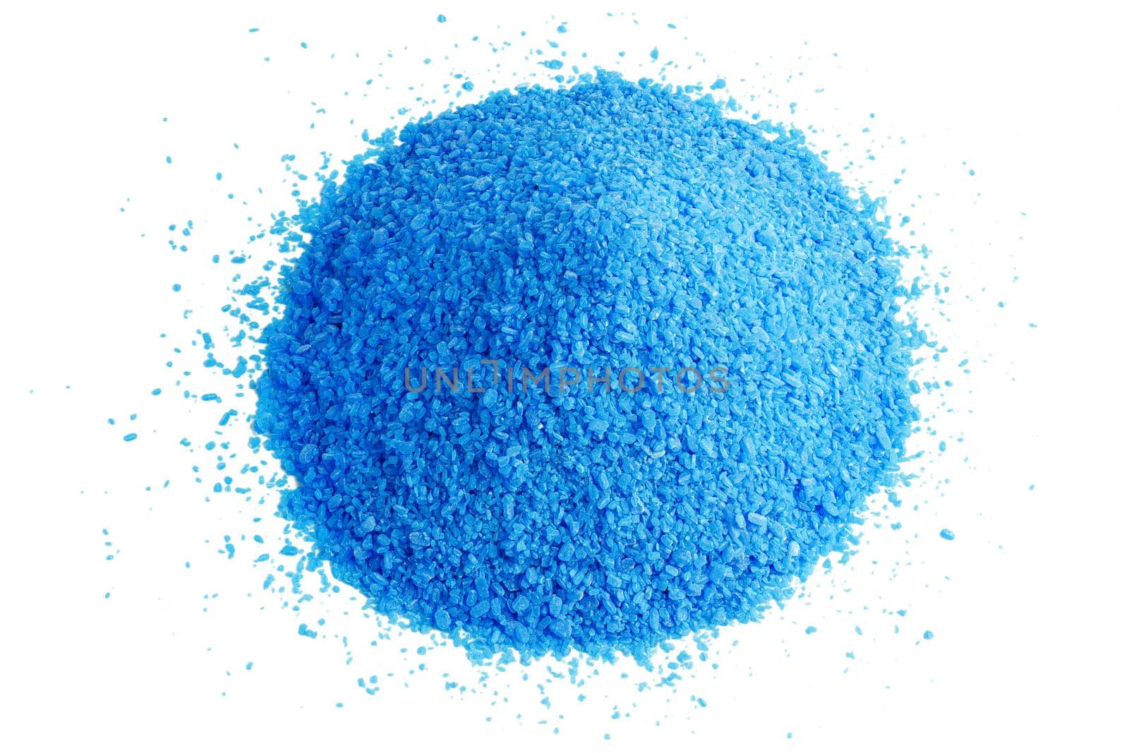 Pile of blue copper sulfate granules - close-up isolated on white background. Edge-to edge sharp.