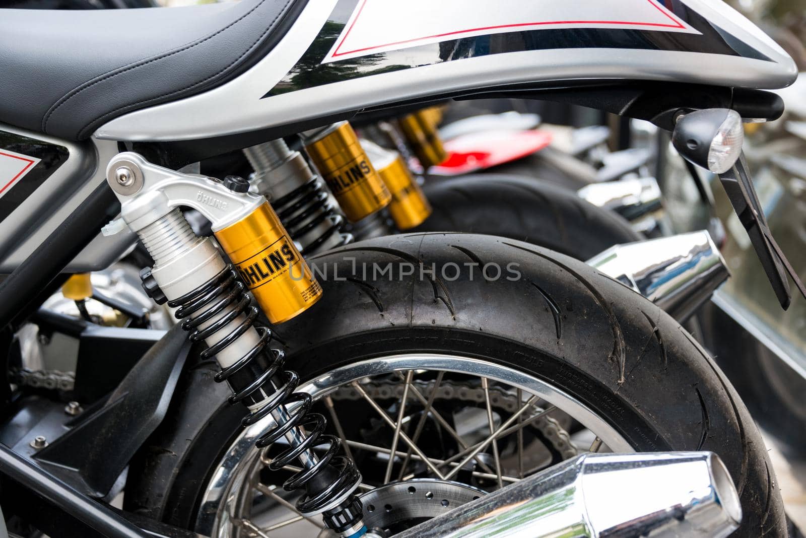 PARIS, FRANCE - CIRCA MAY 2013: Ohlins shock absorbers, motorcycle rear suspsension detail.