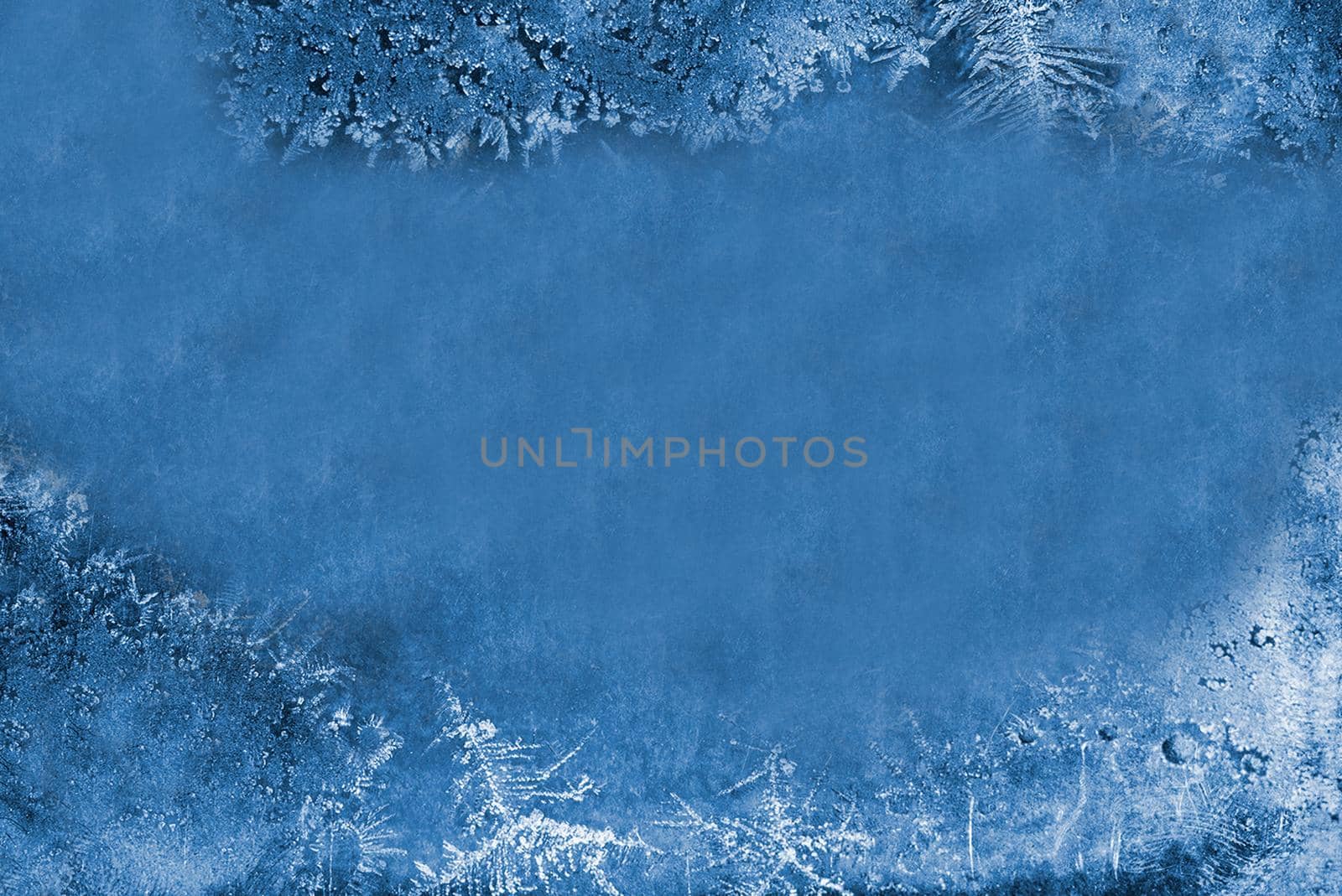 The patterns made by the frost on the window hoarfrost background .Texture or background