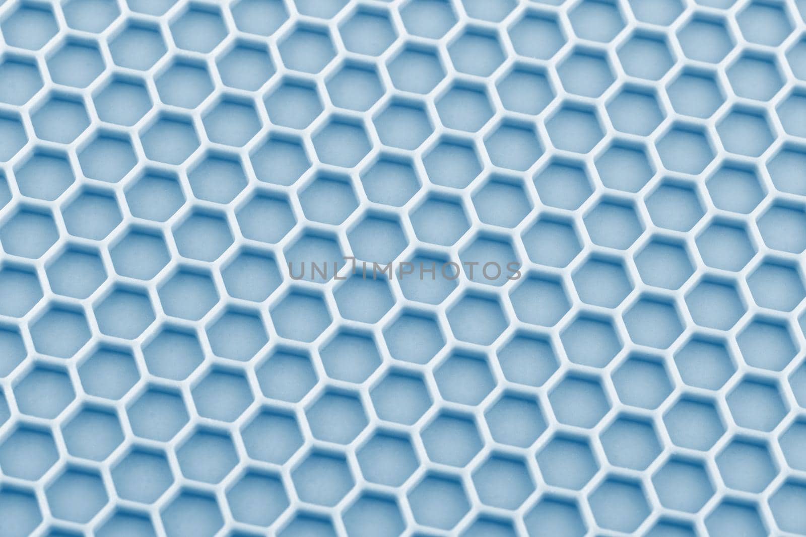 abstract pastel cyan blue honeycomb close-up unobtrusive photo background.