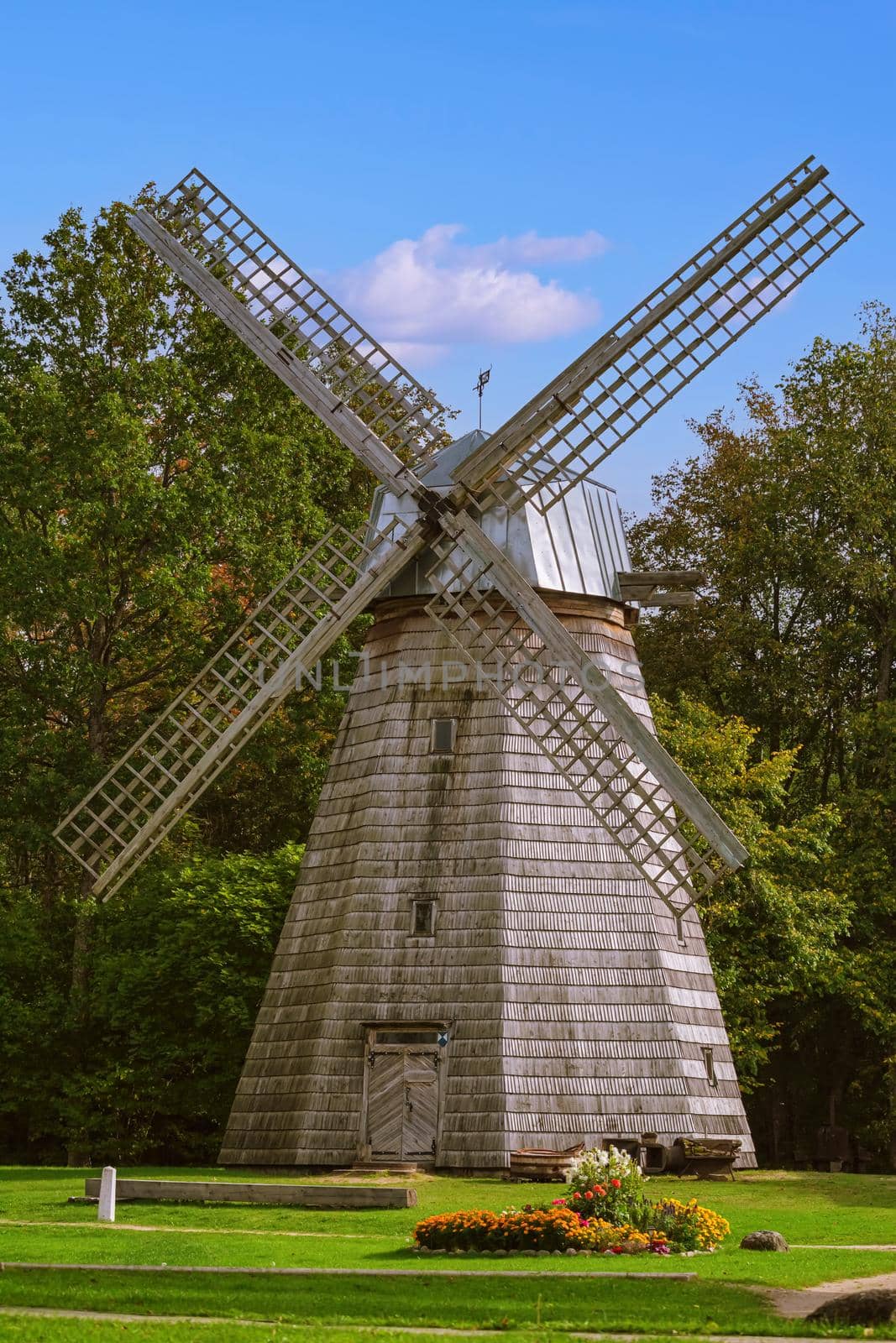 Rural scene in Latvia - Old wooden windmill