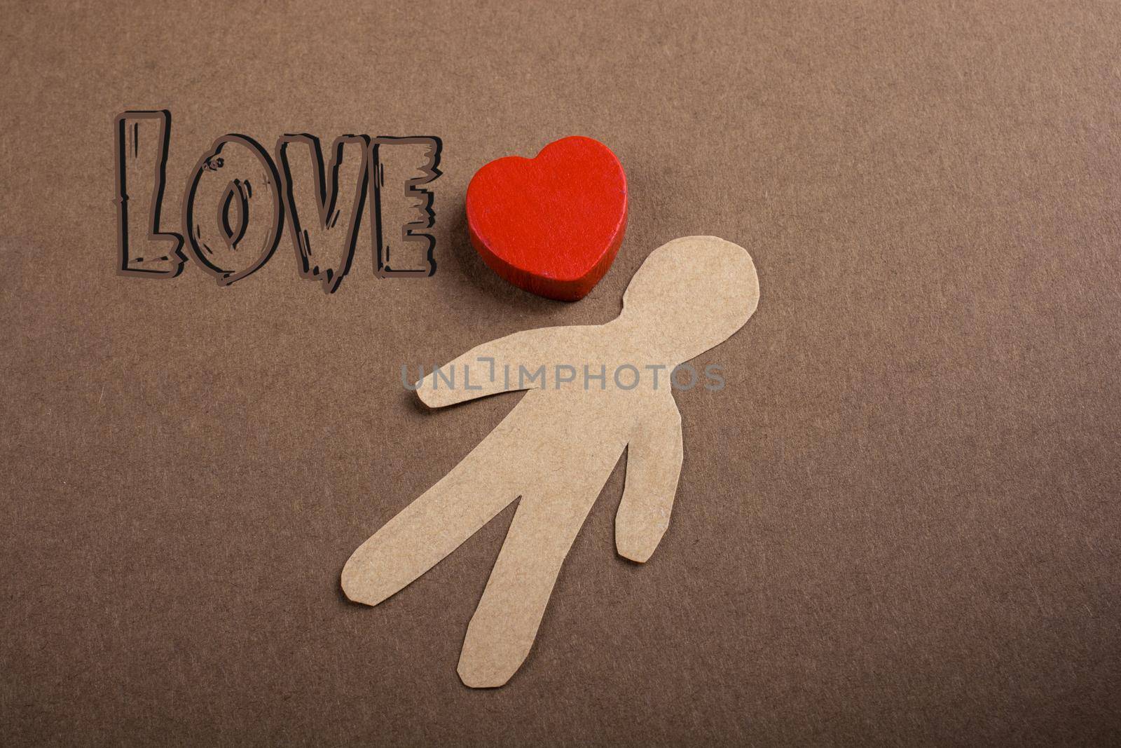 Love icon and Valentine's day wording on torn paper