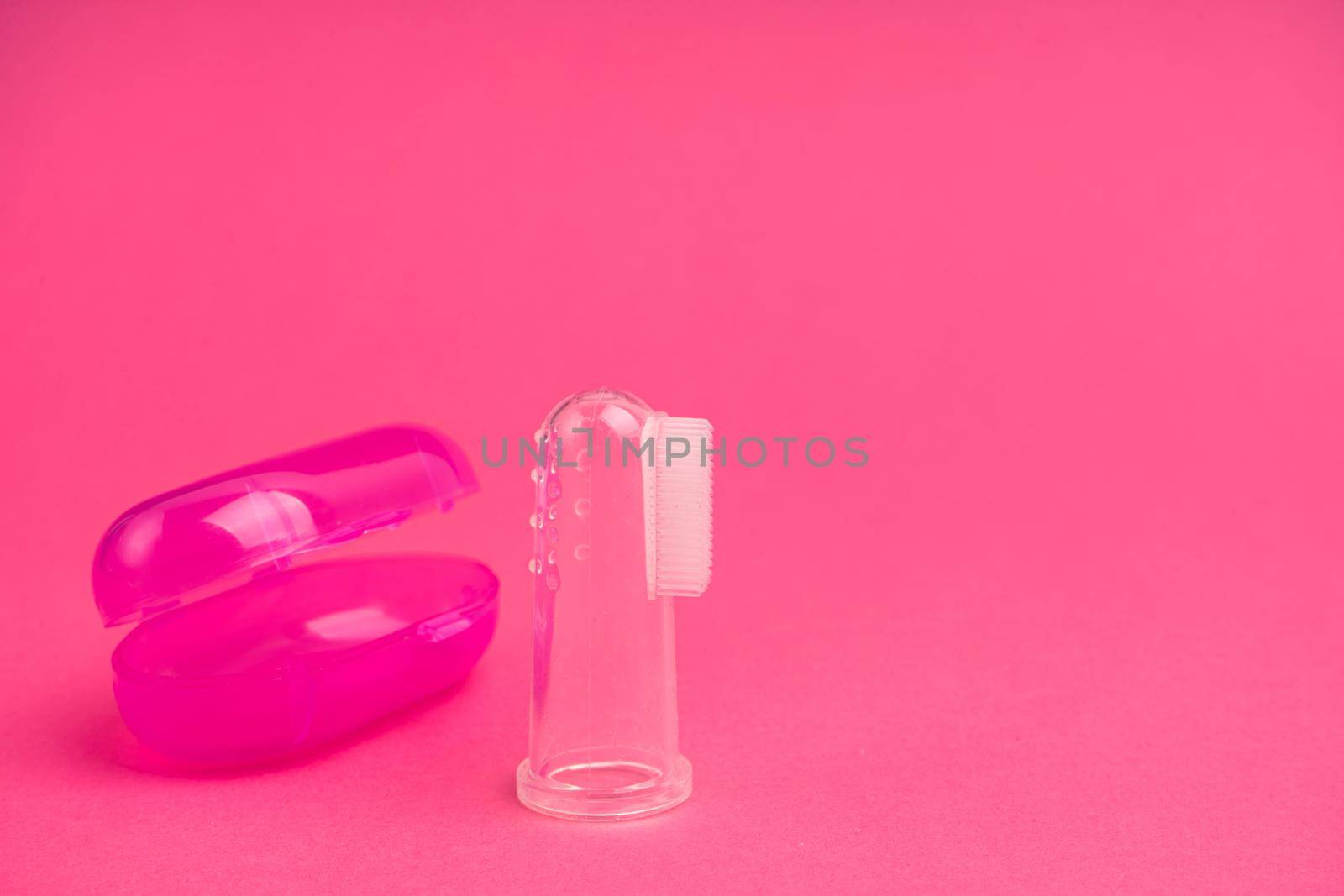 Compact toothbrush fingertip. Travel hygiene close up by Try_my_best
