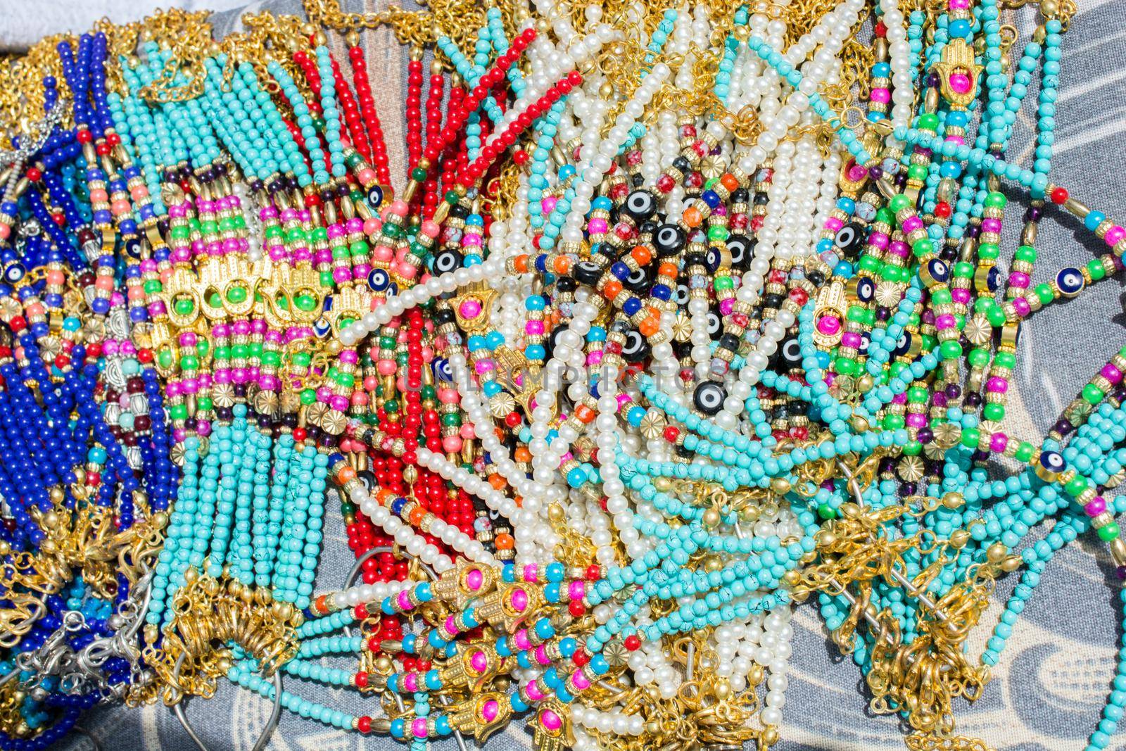 Colorful beads of various color at a market