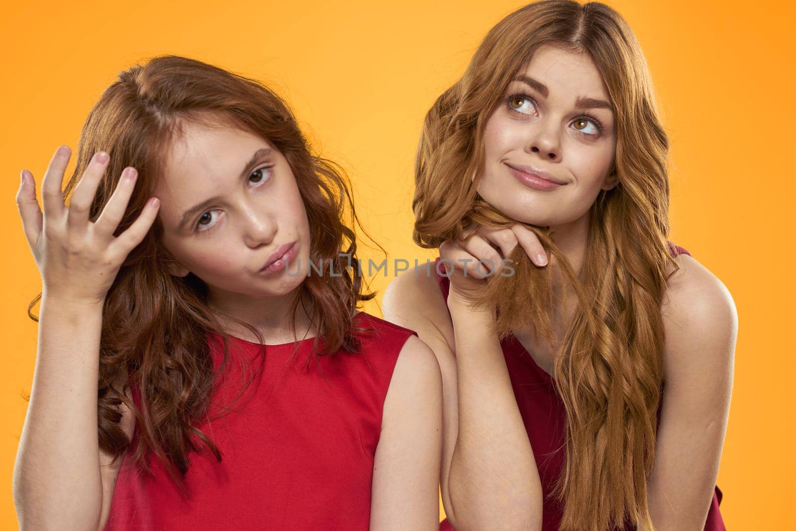 Family fun friendship emotions lifestyle yellow background. High quality photo