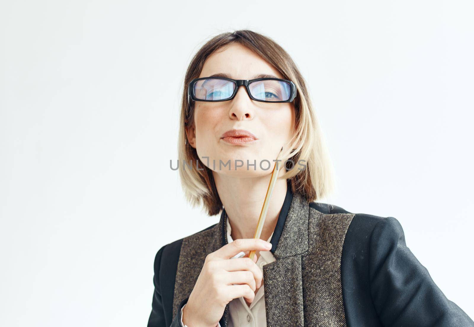 Woman with glasses and a jacket business finance stationery. High quality photo