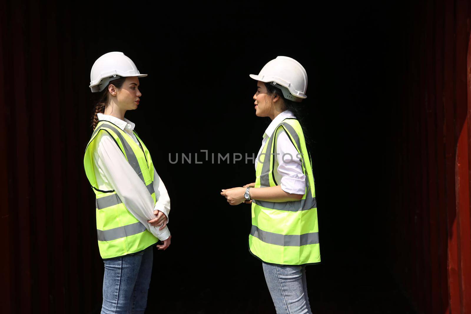 Employees in logistics company shipping container by chuanchai