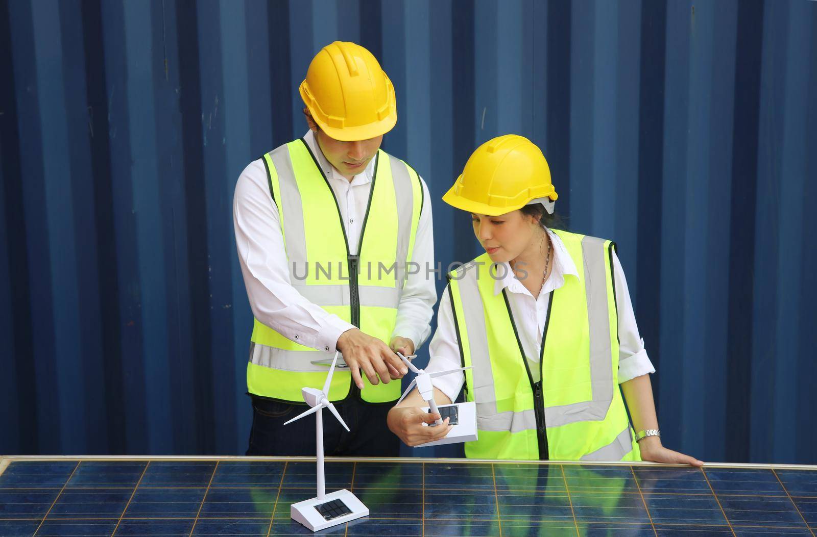 technicians install panels Solar cells to produce and distribute electricity. Energy technology concept