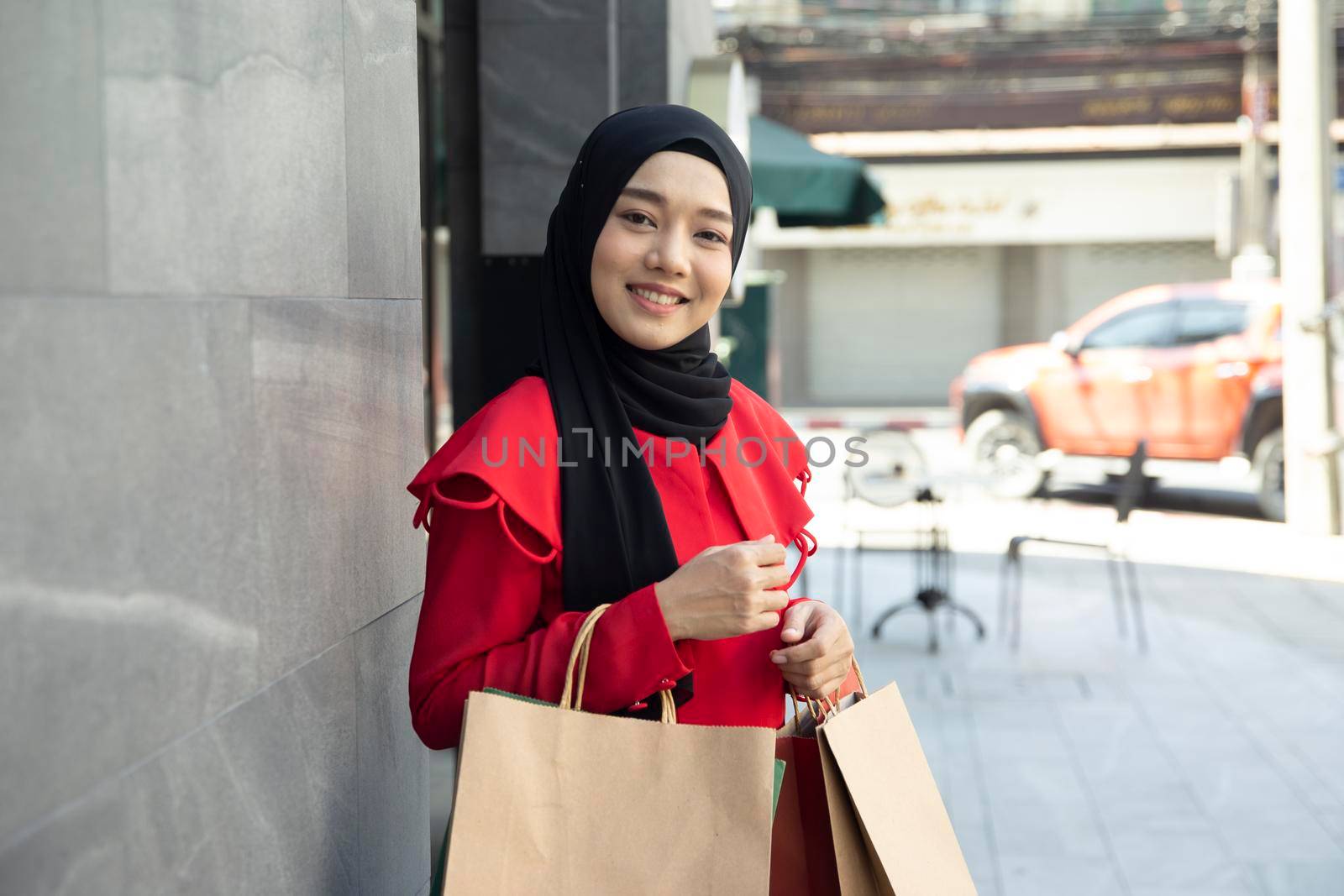 Shopping woman holding shopping bags 