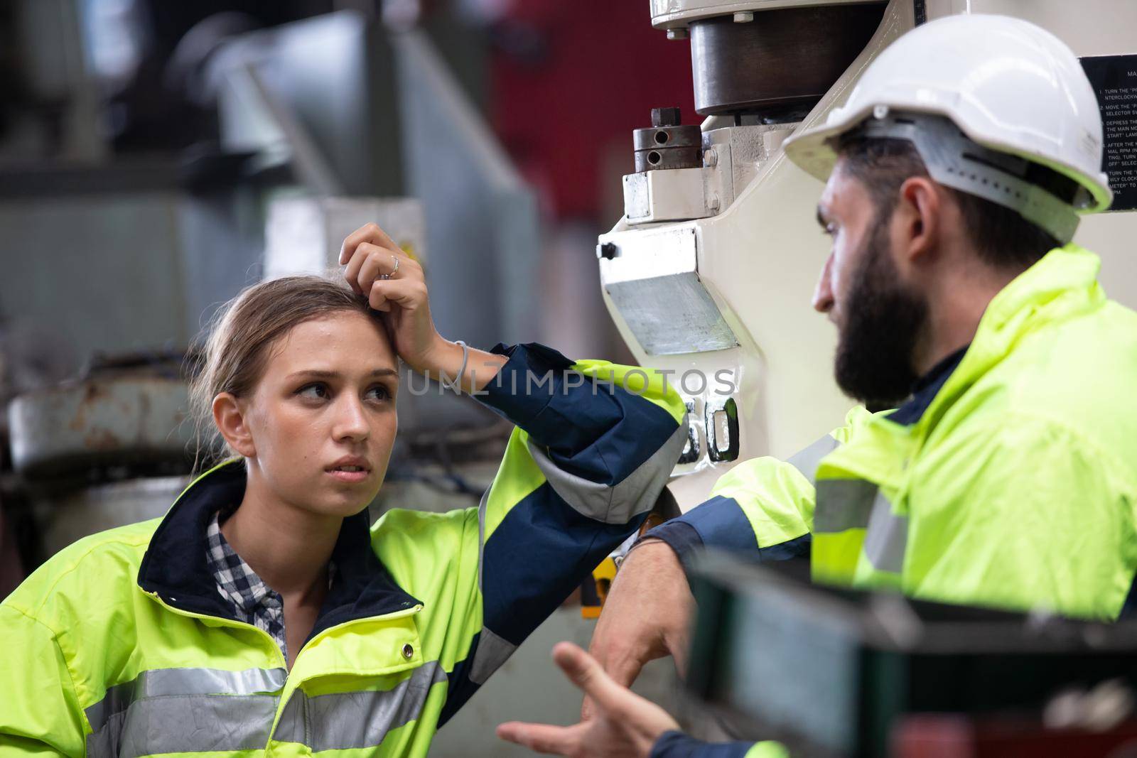 Portrait woman worker and engineer under inspection and checking production process on factory station by chuanchai