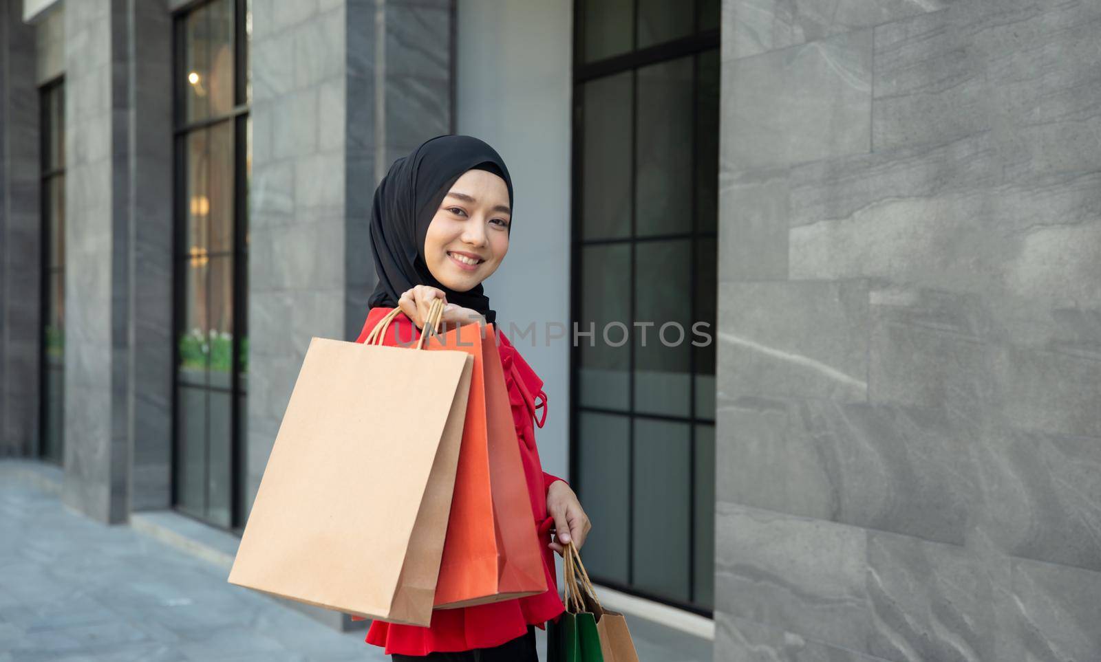 Shopping woman holding shopping bags 
