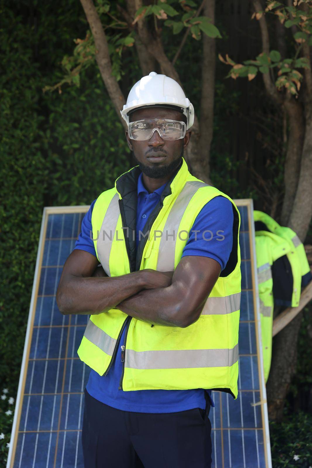 maintenance engineer, Solar energy systems engineer perform analysis solar panels, Portrait of engineer man or worker, people, with solar panels or solar cells on the roof in farm. Power plant with green field, renewable energy source in American. Eco technology for electric power.
