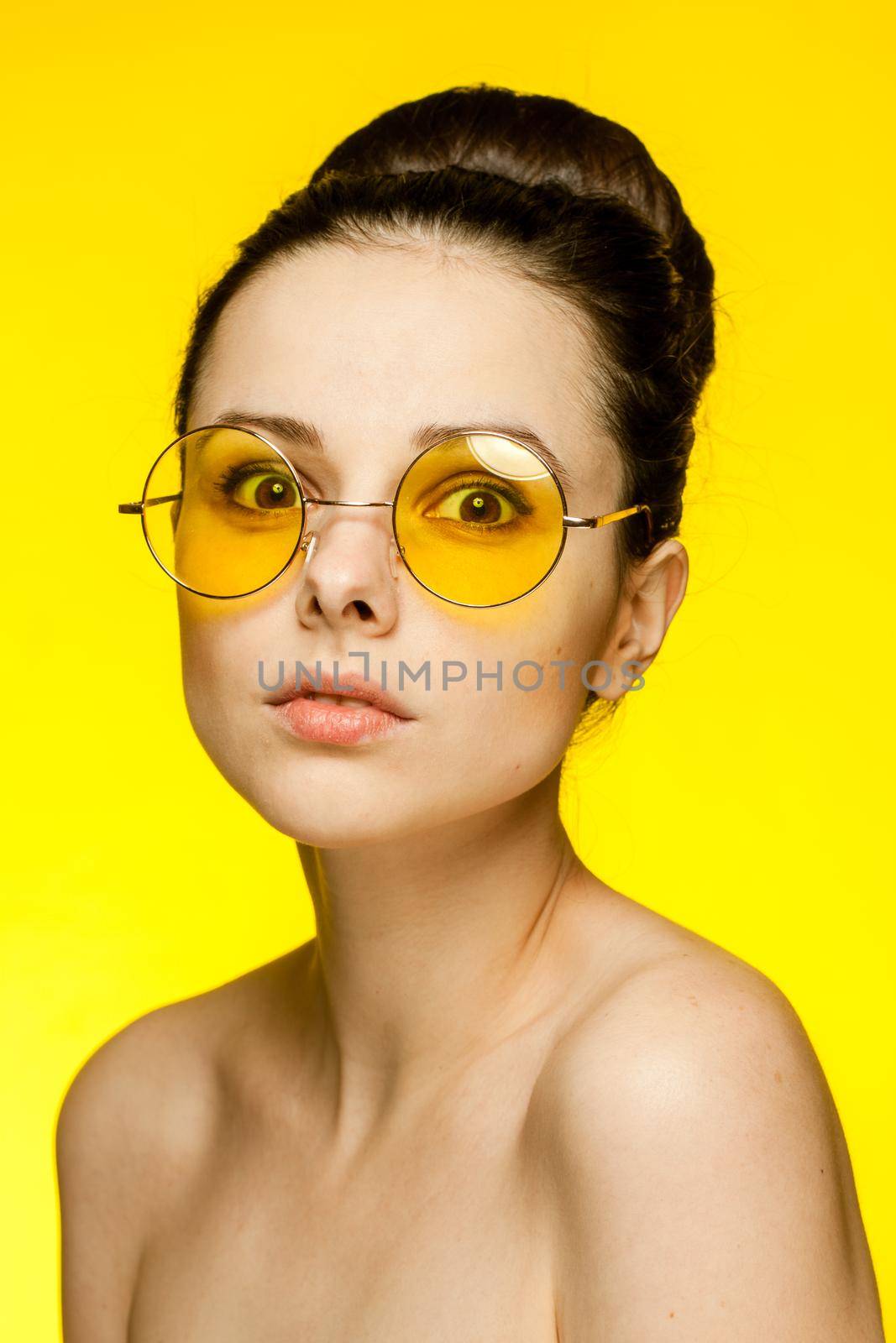 sexy brunette naked shoulders fashion glasses cropped view. High quality photo