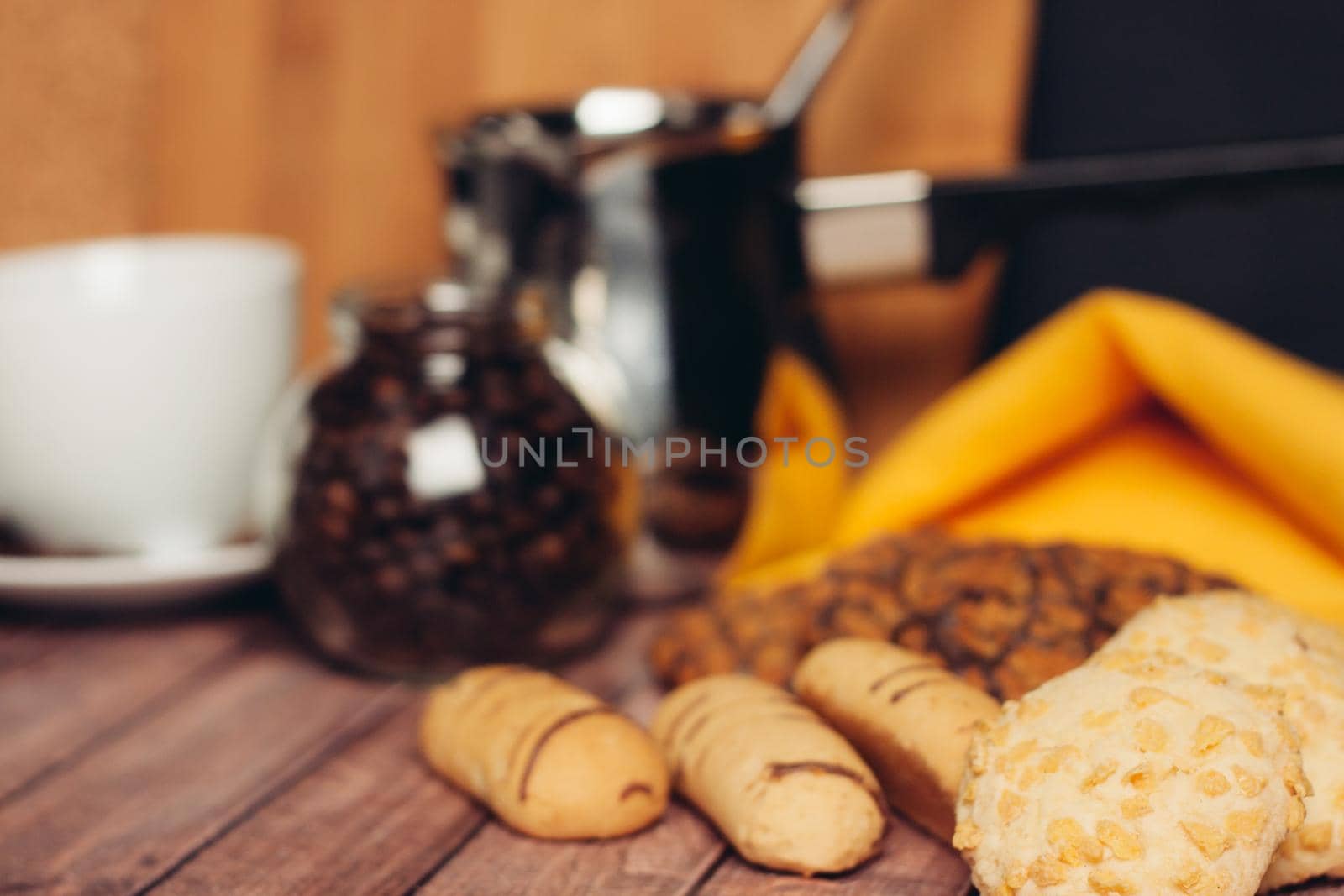 sweet biscuits on a plate a cup with a drink candy Dessert snack. High quality photo