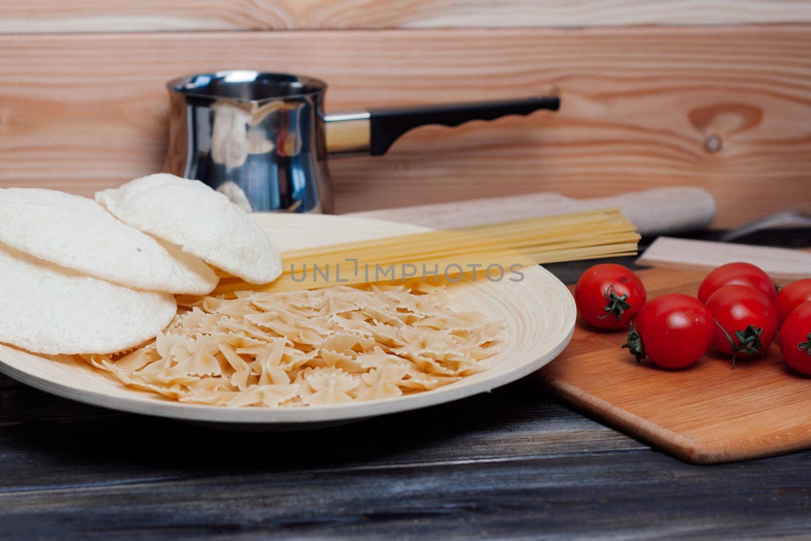pasta on wooden table ingredients cooking diet food. High quality photo