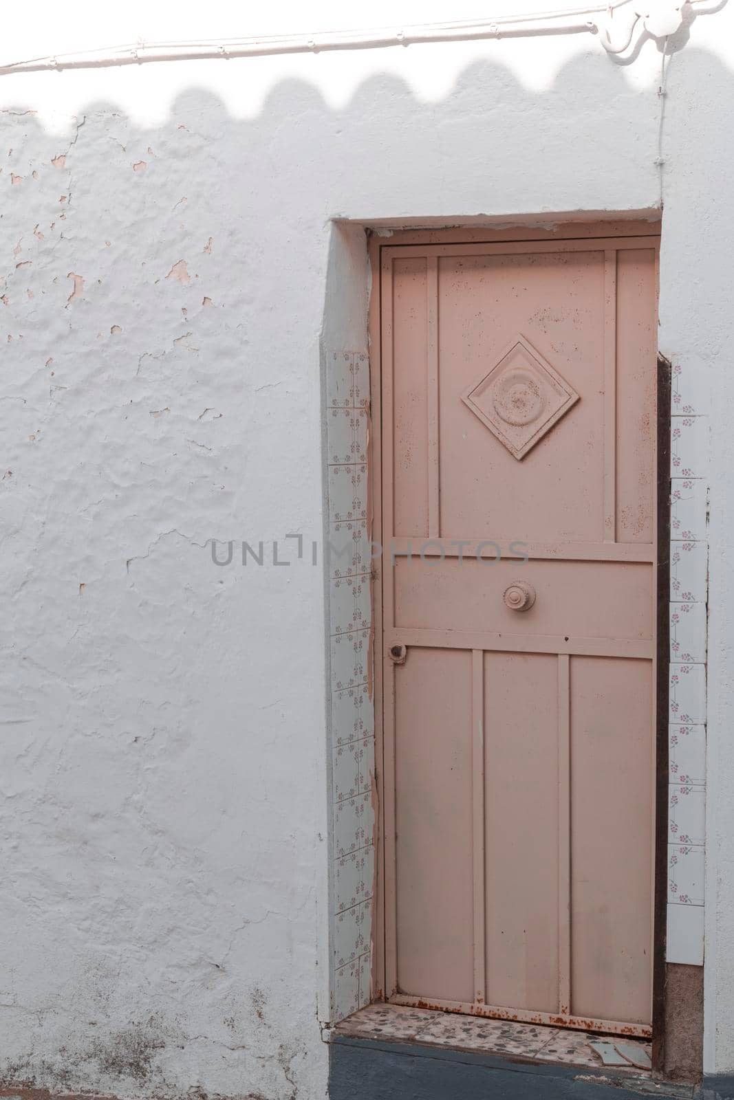 Door of a rustic house, in a village of Andalusia in southern Spain