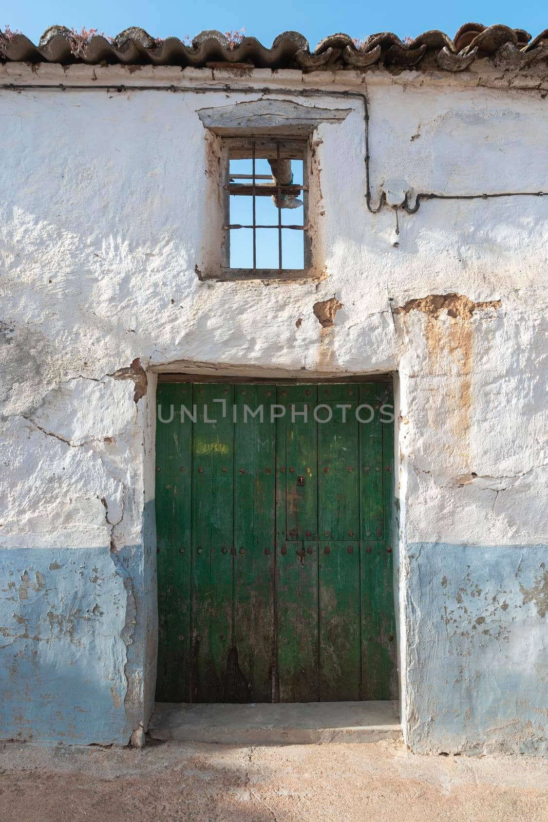 Door of a rustic house, in a village of Andalusia in southern Spain