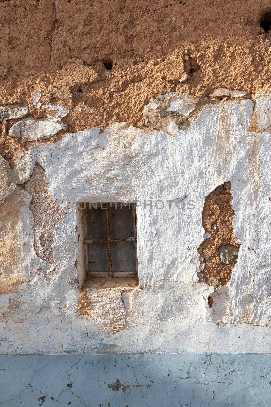 Window of a ruined house in an Andalusian village in southern Spain