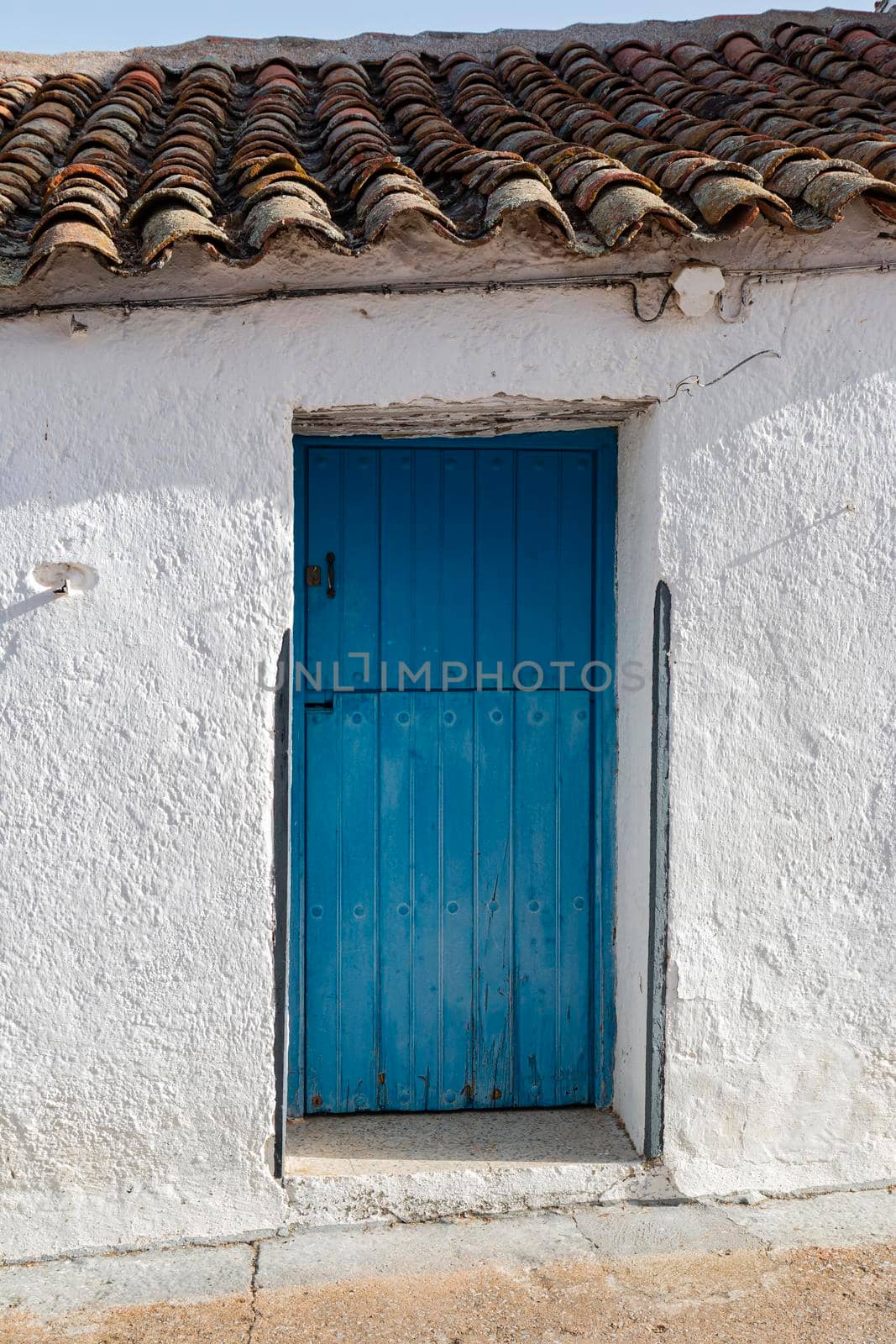 Door of a rustic house, in a village of Andalusia in southern Spain