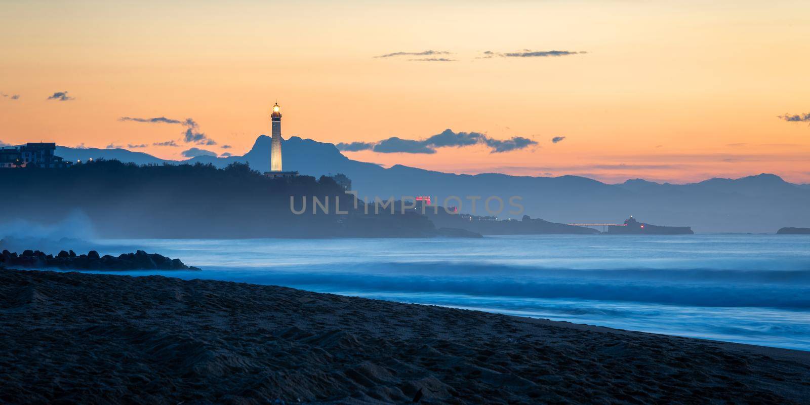 Biarritz lighthouse at sunset, France by dutourdumonde