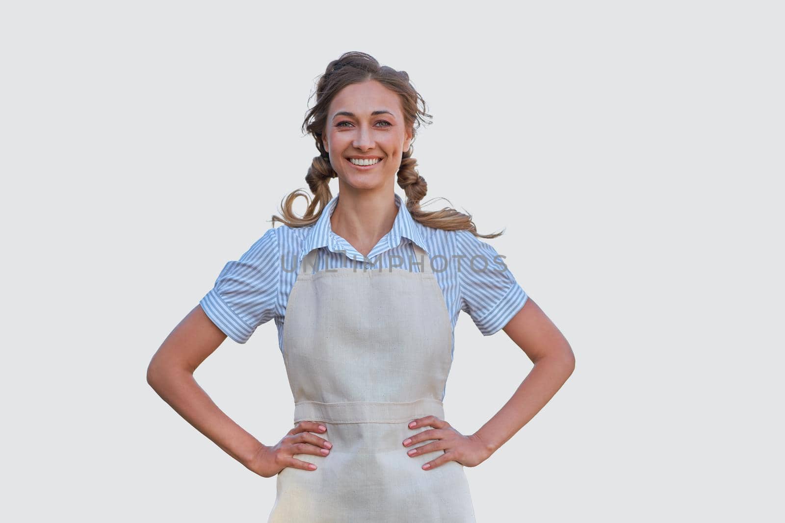 Woman dressed apron white background Caucasian middle age female business owner in uniform Happy one person smiling Time to advertise Small business