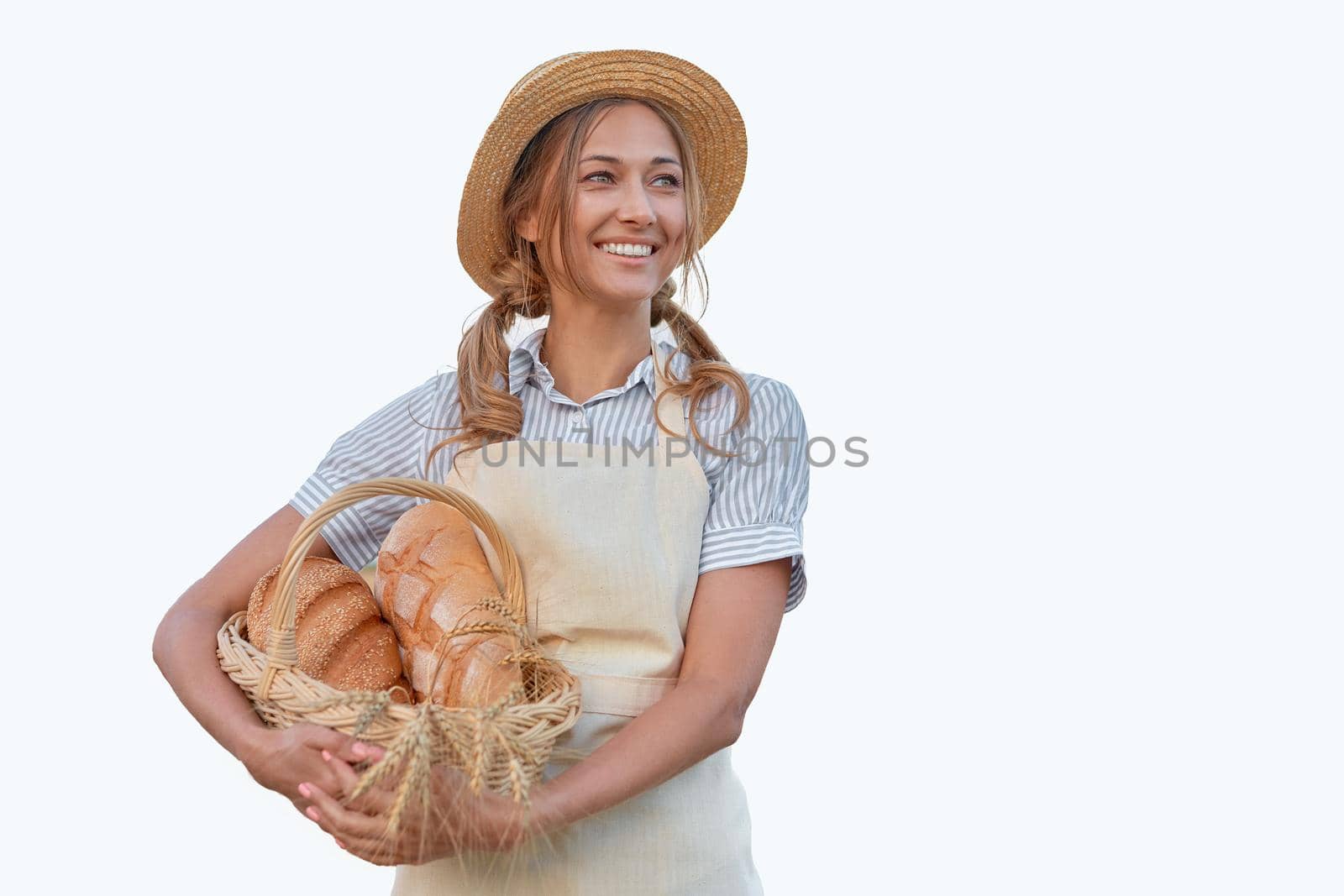 Woman dressed apron white background Farmer bread basket Agricultural concept Caucasian middle age Female business owner in uniform Happy one person smiling Time to advertise Banner Thumb up