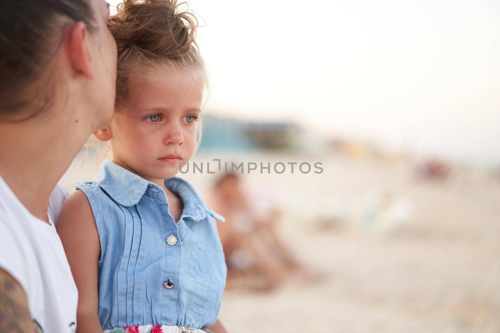 Little girl crying Mother daughter summer beach. Child upset and cry Adorable caucasian kid cry Childhood problems