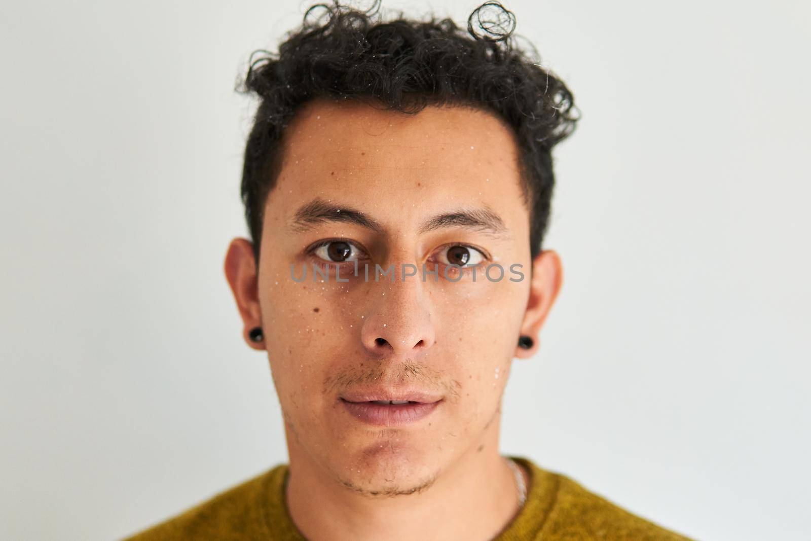 Portrait of a worker with a yellow T-shirt