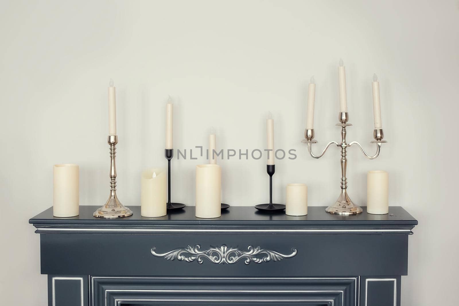 Candles of various types and sizes with and without candlesticks fireplace by galinasharapova