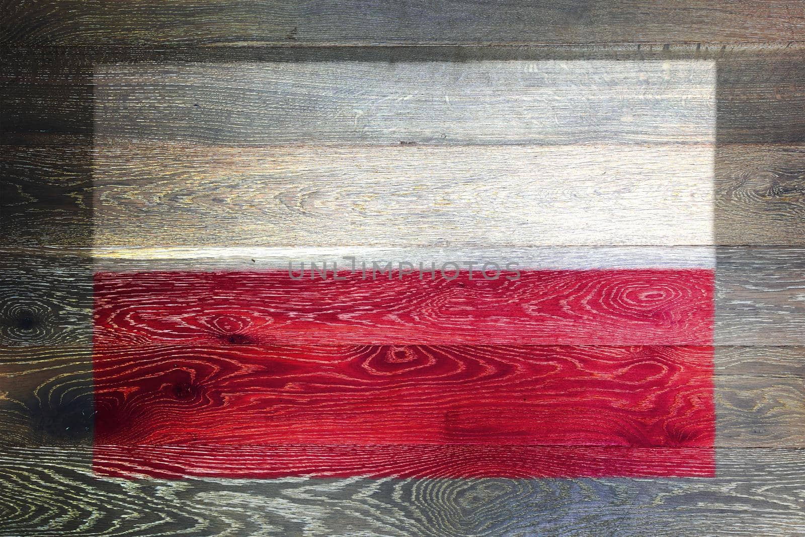 A Poland flag on rustic old wood surface background
