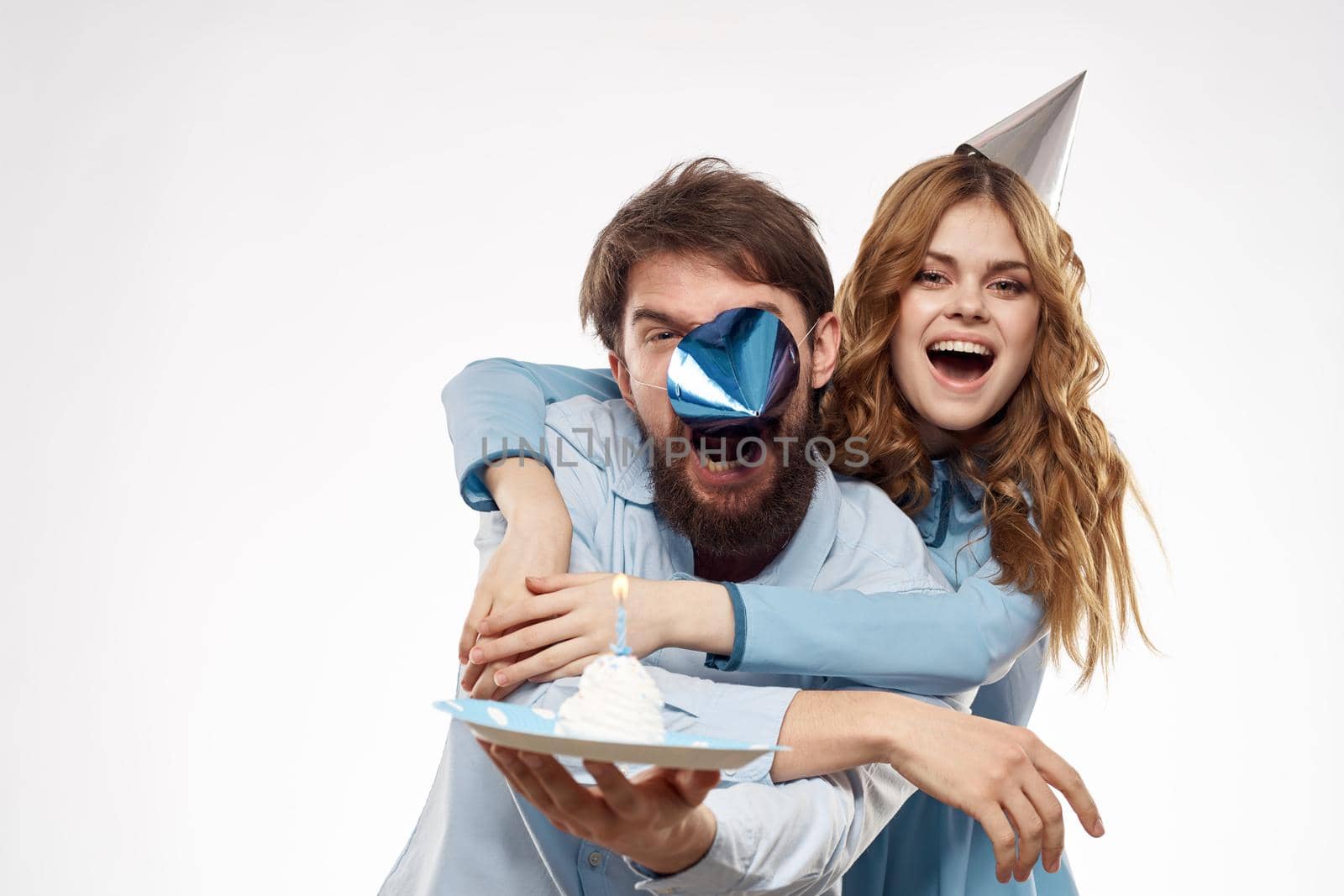 party man and woman birthday cake corporate fun white background. High quality photo