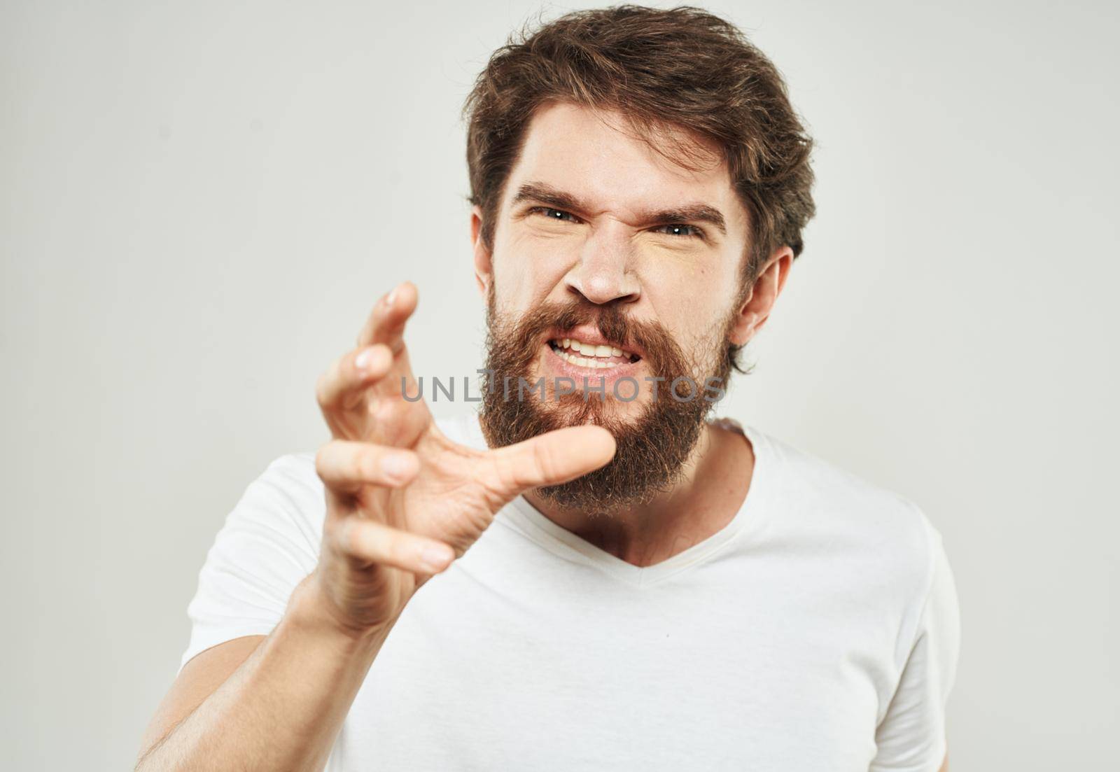aggressive men outrage stress cry bushy beard. High quality photo