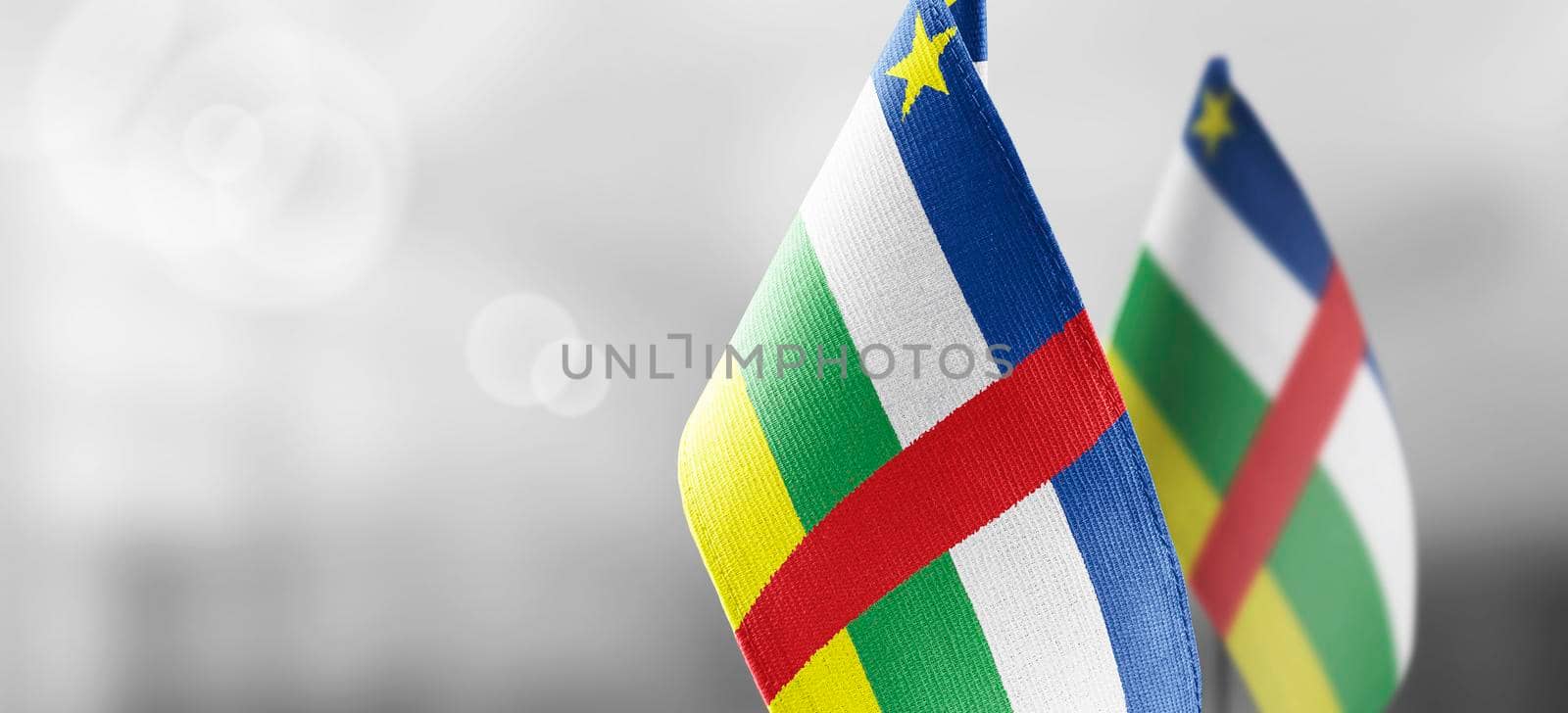 Patch of the national flag of the Central African Republic on a white t-shirt.