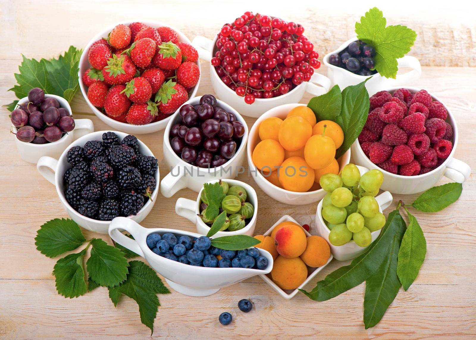 berry mix isolated on a white background by aprilphoto