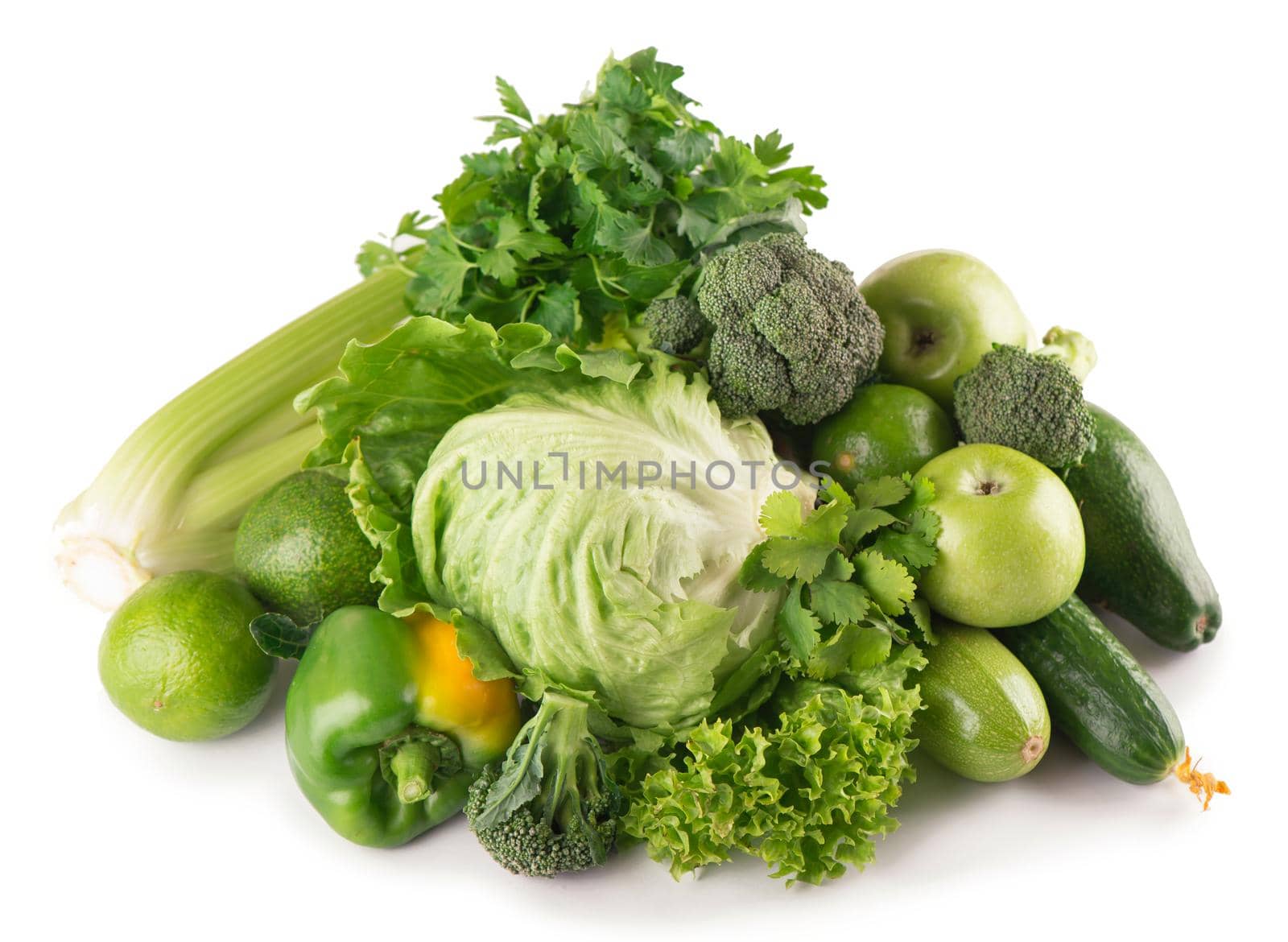 green fruits and vegetables on white background . by aprilphoto