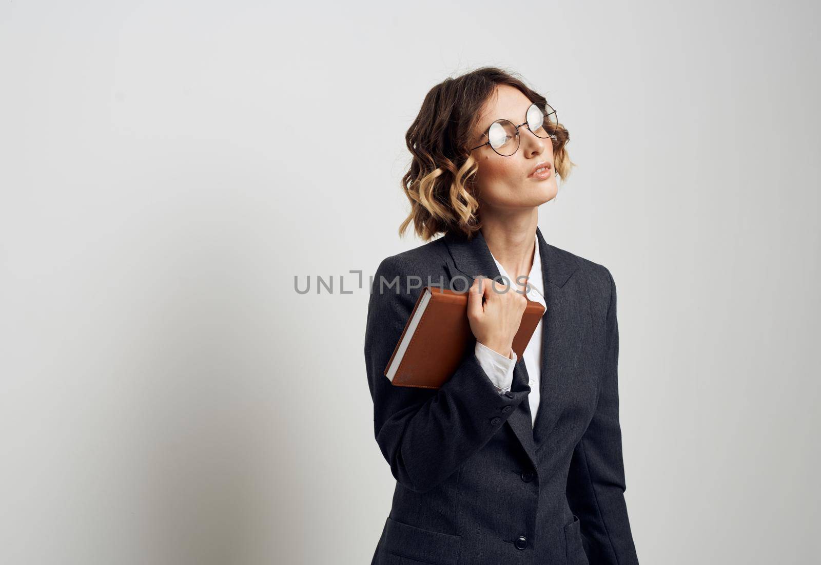 Woman business finance documents glasses suit. High quality photo