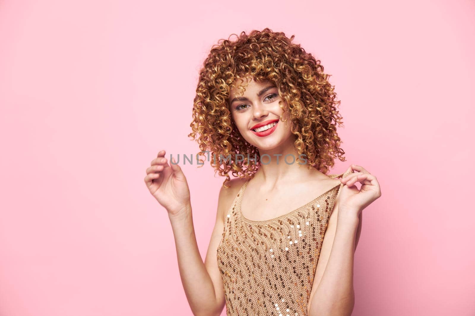 Charming model Curly hair smile red lips fun sequin shirt pink background