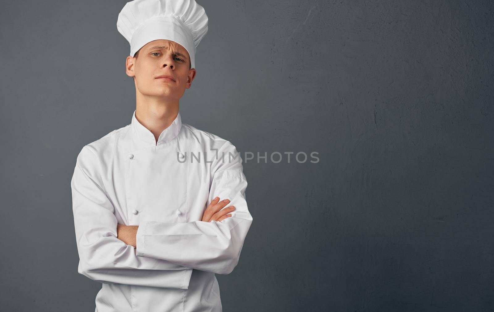 male chef cooking food hand gestures restaurant food preparation service. High quality photo