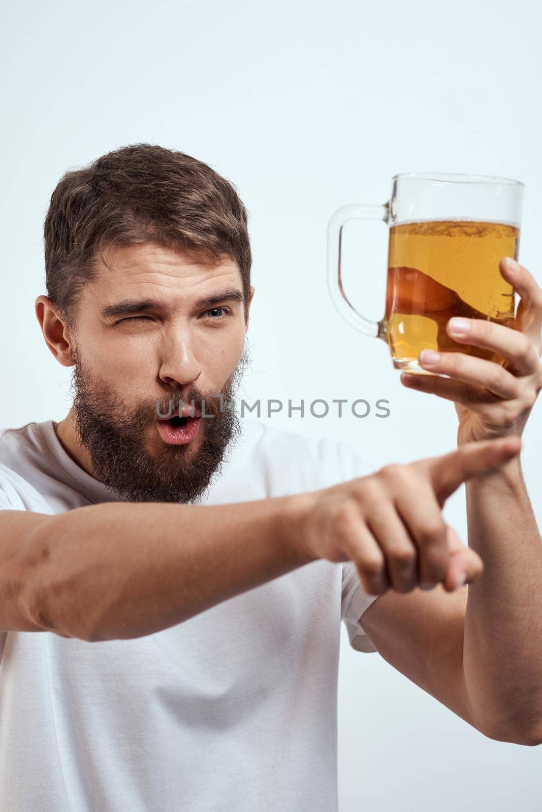 Cheerful man mug beer alcohol drunk lifestyle. High quality photo