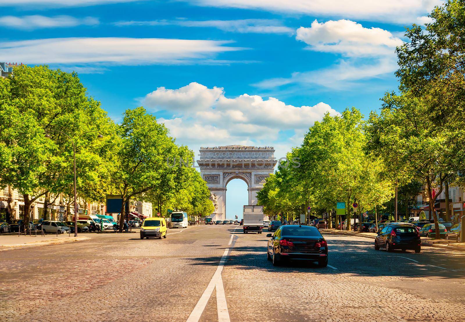 Road of Champs Elysee leading to Arc de Triomphe in Paris, France