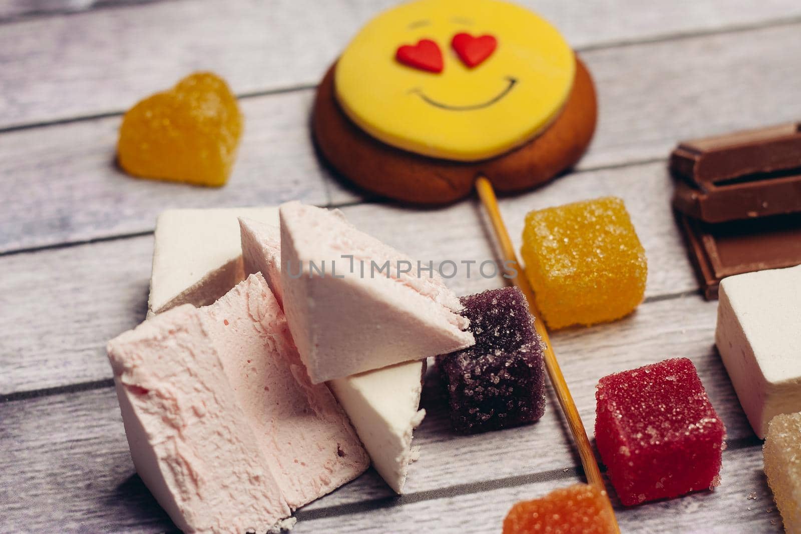gingerbread in the form of a smiley on a stick marmalade sweets dessert. High quality photo
