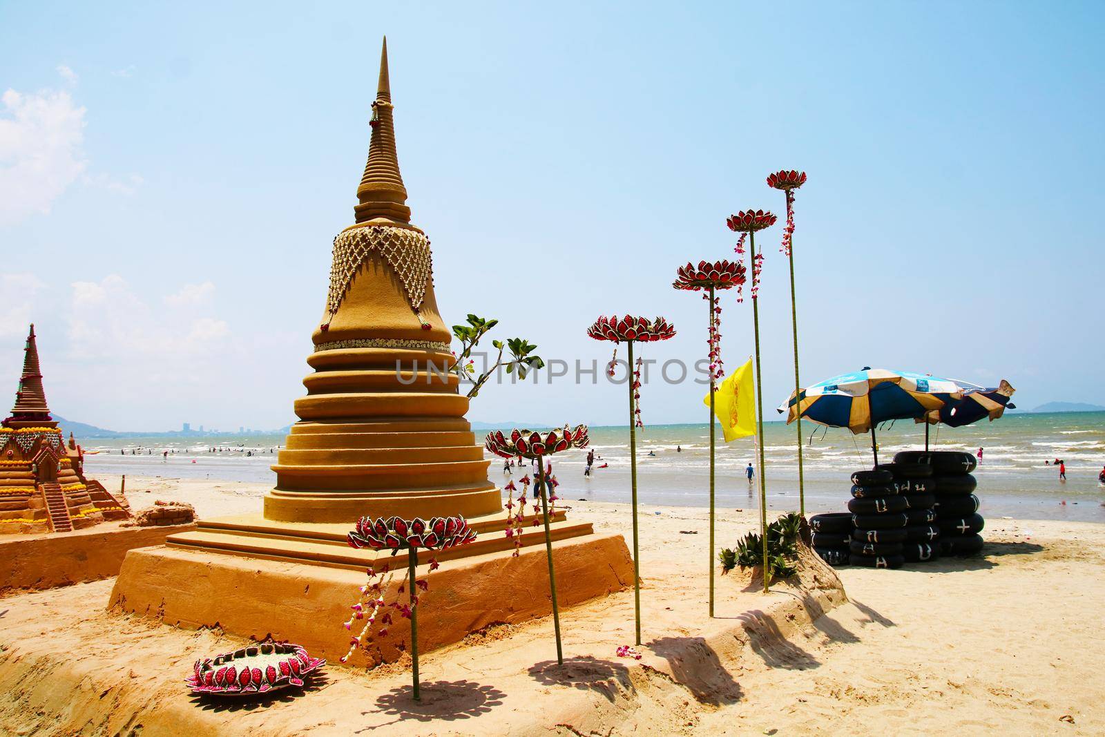 sand pagoda and seven lotus in Songkran festival represents In order to take the sand scraps attached to the feet from the temple to return the temple in the shape of a sand pagoda
