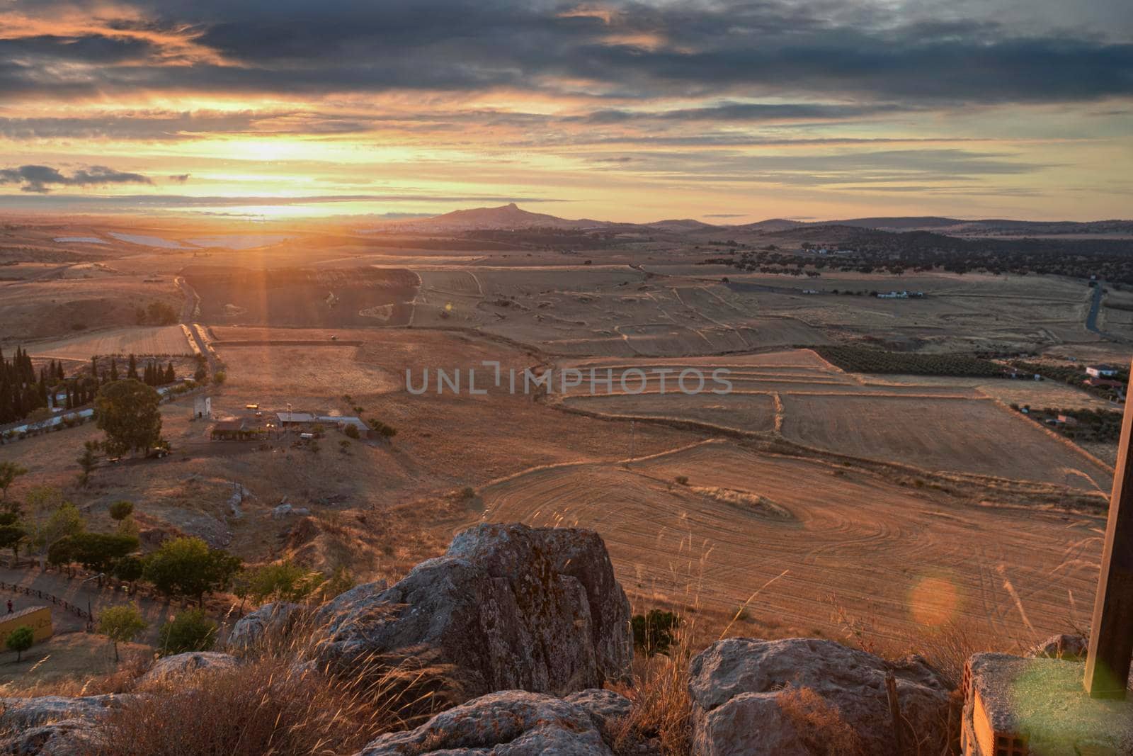 Small Andalusian town in southern Spain with clouds by loopneo