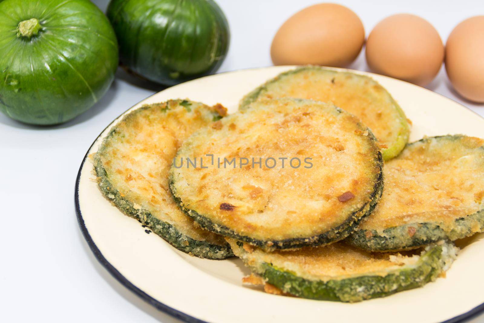 Trunk zucchini in baked or fried milanesas, Argentine cuisine