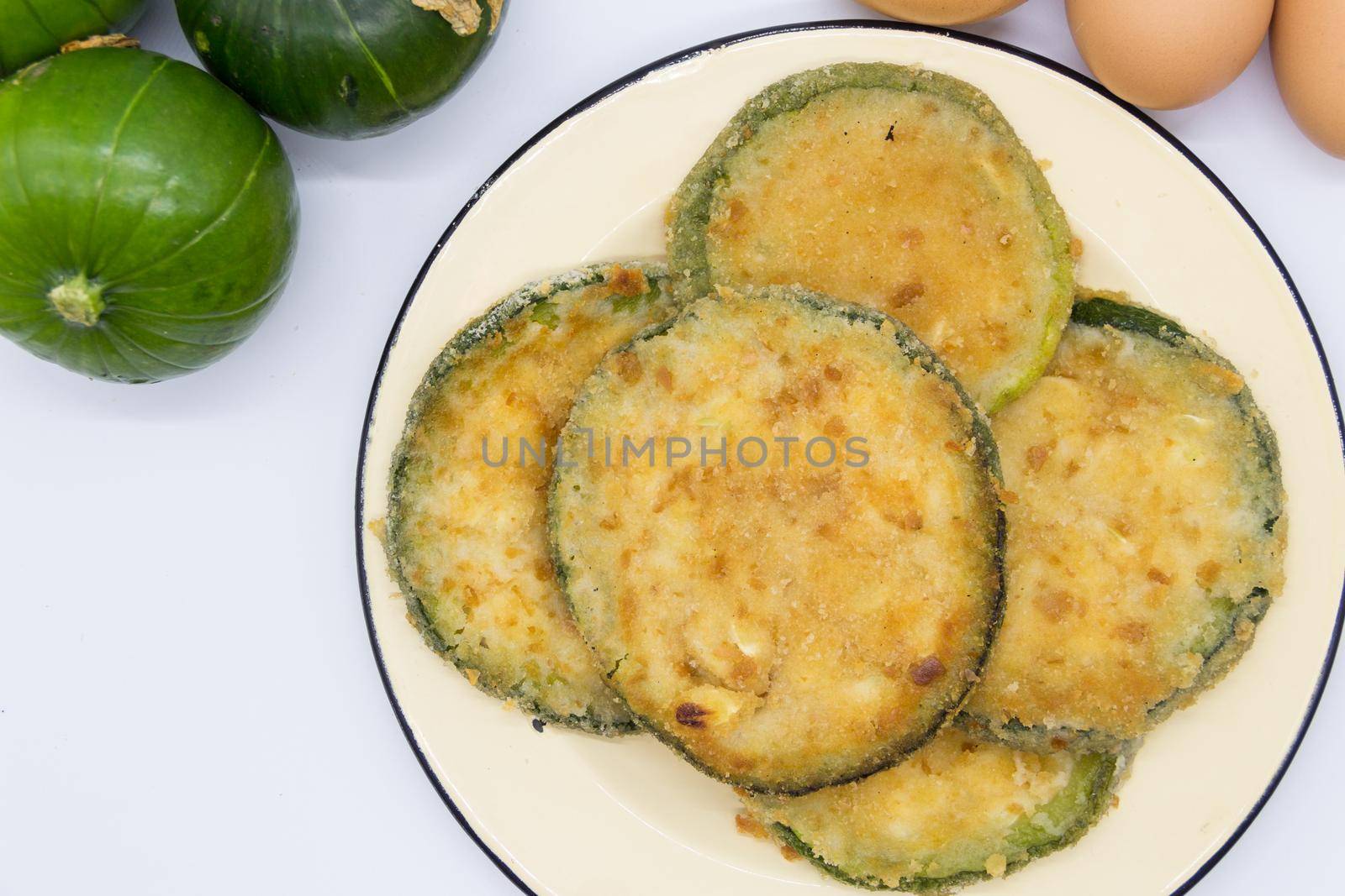 Trunk zucchini in baked or fried milanesas, Argentine cuisine by GabrielaBertolini